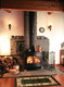 Classic Black Defiant wood stove in living room