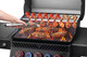 food on grill and optional warming shelf