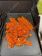 chorizo cooking on griddle