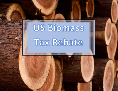 pile of wood with US Biomass Tax Rebate sign