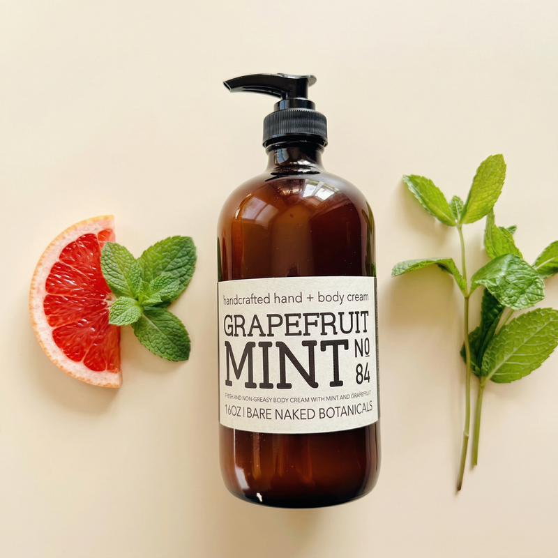 Grapefruit Mint Hand and Body Cream in amber glass jar with light whipped texture, fresh citrus and mint-inspired skincare
