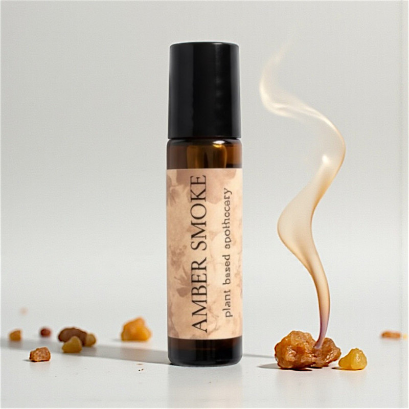 Amber Smoke Perfume Rollerball warm smoky botanical fragrance in a glass roller bottle