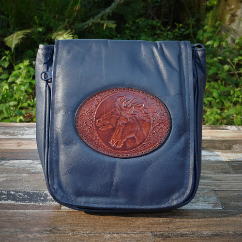 Navy "Little Black Purse" with Tooled Double Horse Heads. Combines the elegant look and quality of soft leather with a Tooled chromed latigo front flap.