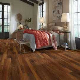 bedroom with red flooring