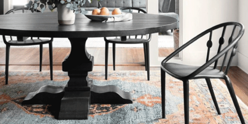 What Size Rug Goes Under a Dining Room Table?