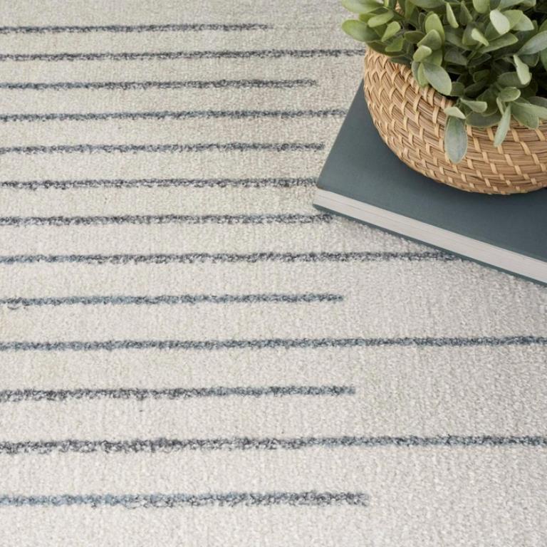 Nourison Astra Machine Washable ASW04 Ivory Blue Area Rug Detail on Floor