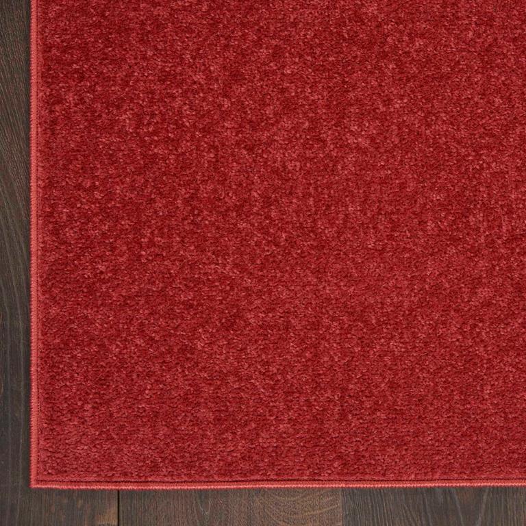 Nourison Essentials NRE01 Brick Red Rug Corner