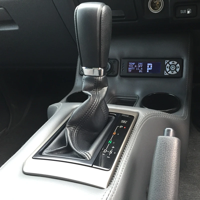 Custom centre console and Compushift display for the 70 Series automatic conversion