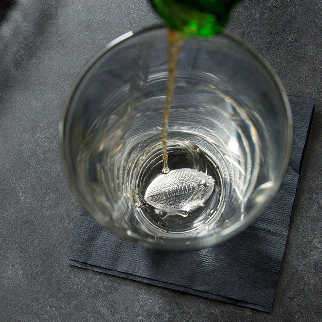 Football beer glass closeup