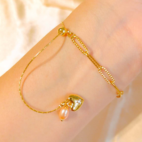 bracelet acier inoxydable doré avec perle baroque nid d'oiseau, rose artisanale, et zircon