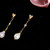 Boucles d'oreilles pendantes artisanales avec perles baroques en forme de goutte d'eau délicate