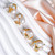 boucles d'oreilles uniques en perles d'eau douce et billes plaqué or, design d'exception