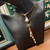 Collier Double Rang "Vaisseau Cosmique" – Perle Baroque & Pendentif Astral