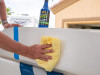 Applying Meguiars M180132 marine vinyl UV protectant to boat interior