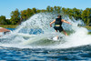 Rider performing aerial trick on O'Brien Torrent Dark Horse wakesurf board