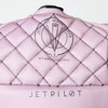 Close-up of Flex Lite neoprene fabric on Jetpilot women’s vest pink back Close-up of Flex Lite neoprene fabric on Jetpilot women’s vest pink back