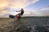 Rider carving  on 2026 Connelly Reverb Wakeboard