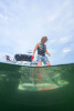 Rider behind boat on 2026 Connelly Reverb Wakeboard