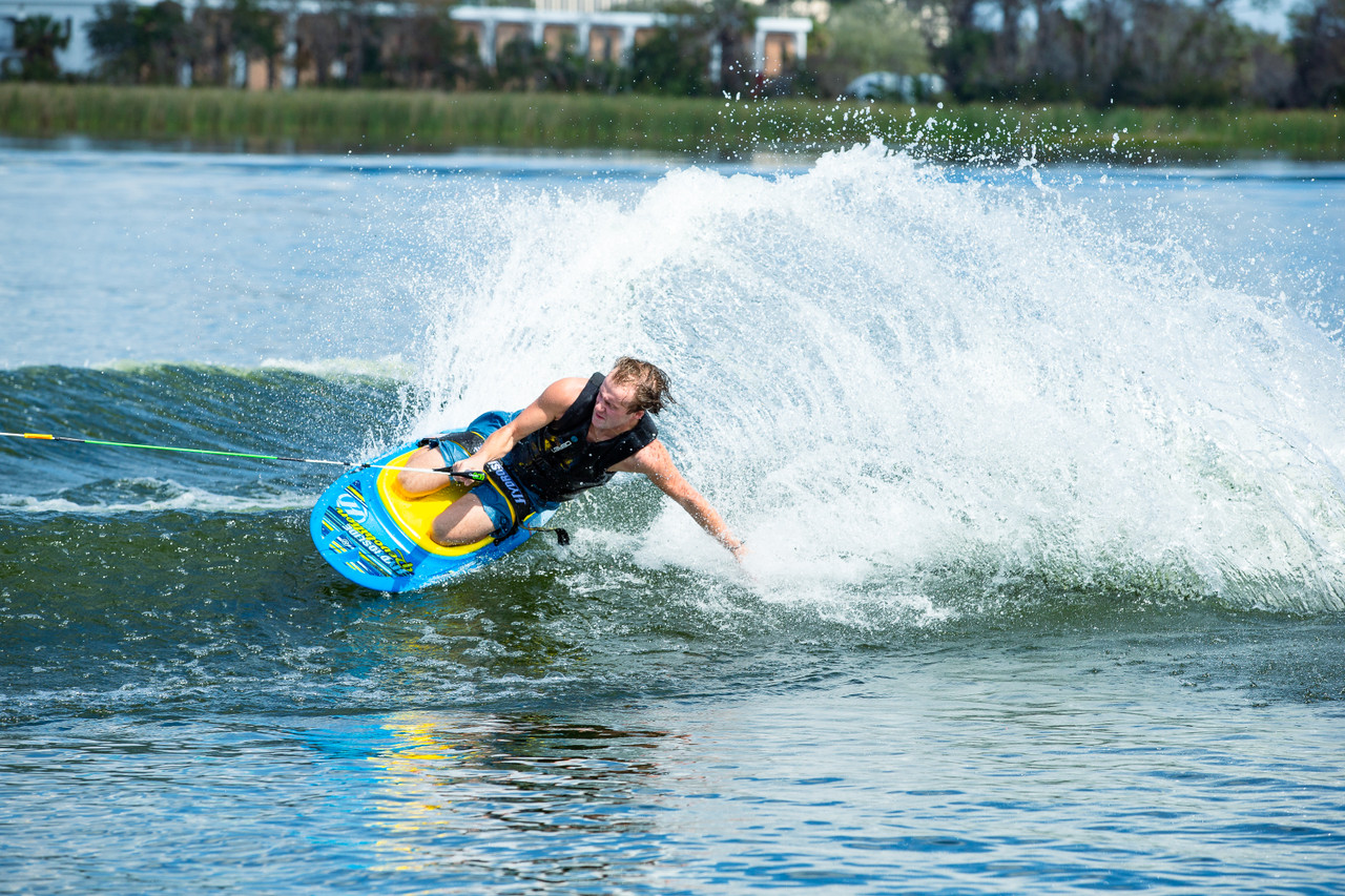 Hydroslide Revolution Kneeboard, kneeboard, spoon shape kneeboard, easy to learn kneeboard, HydroHook kneeboard, best kneeboard for beginners, high-performance kneeboard, kneeboard with knee wells, durable kneeboard, buoyant kneeboard, Hydroslide kneeboard, water sports equipment, kneeboarding tricks, EVA knee pad kneeboard, wakeboarding kneeboard, padded kneeboard strap, USA-made kneeboard, Midvale Utah boating, kneeboards for sale, kneeboarding for beginners