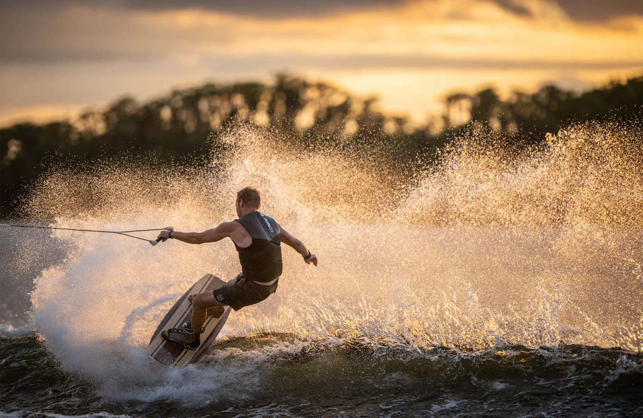 Rider wearing Connelly Sidewinder Neo Comp Vest on the water