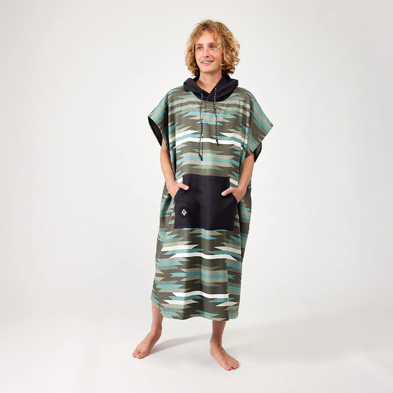 changing poncho, Nomadix changing poncho, Jackson Green poncho, surf poncho, wakeboarding poncho, eco-friendly poncho, recycled polyester poncho, quick-dry poncho, super absorbent poncho, sand-resistant poncho, sustainable changing poncho, adventure poncho, MicroTerry poncho, beach poncho, outdoor changing poncho