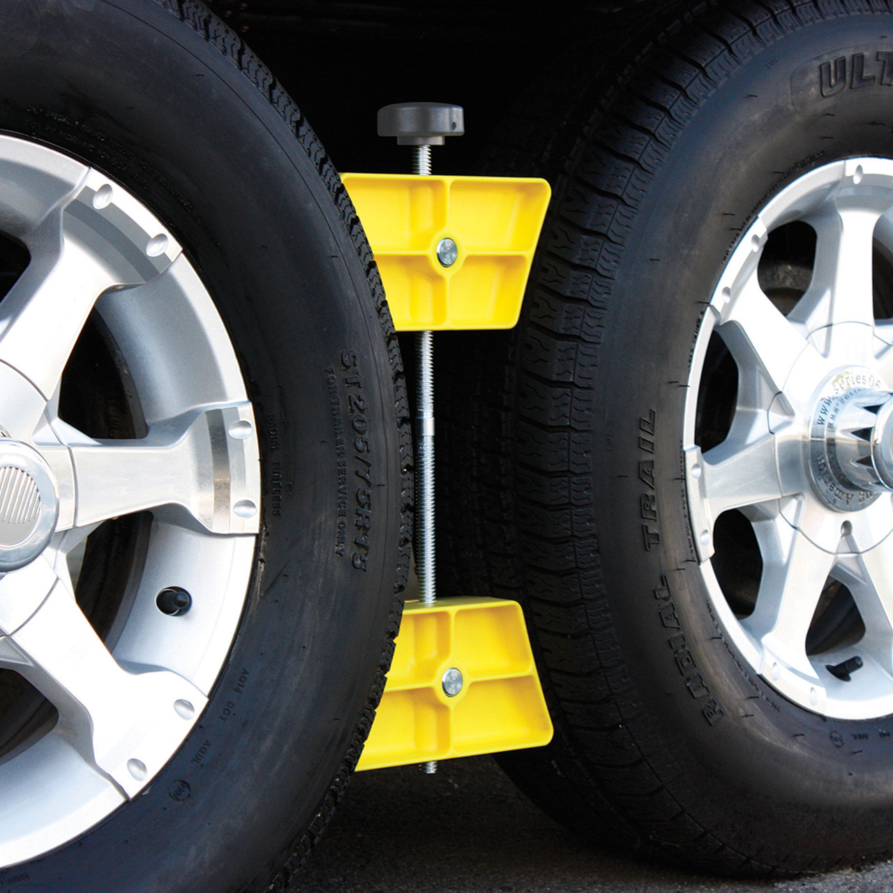RV wheel stop, RV wheel chock, trailer wheel chock, tandem tire stabilizer, Camco wheel stop, RV camping gear, trailer stabilizer, camper tire chock, RV safety accessory, re-hitching wheel stop