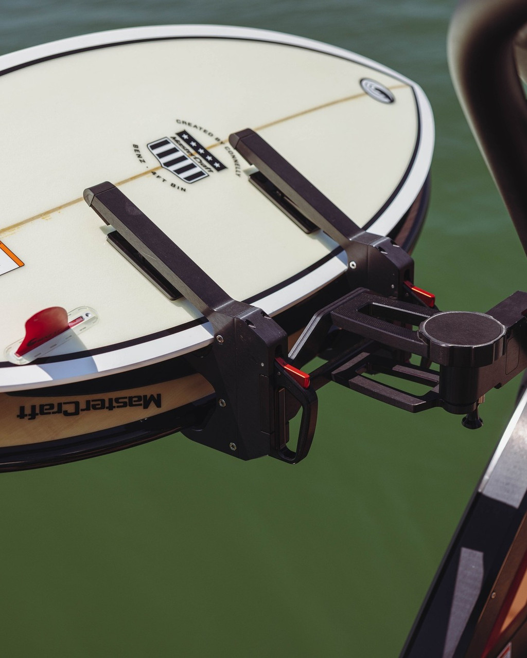Close-up of MasterCraft logo on Benz wakesurf board