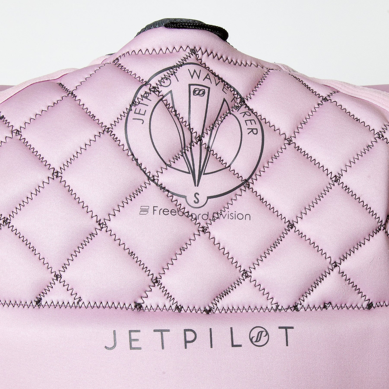Close-up of Flex Lite neoprene fabric on Jetpilot women’s vest pink back Close-up of Flex Lite neoprene fabric on Jetpilot women’s vest pink back
