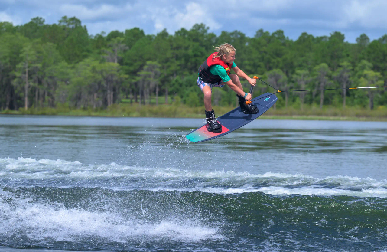 Kid doing trick on Connelly Surge Wakeboard