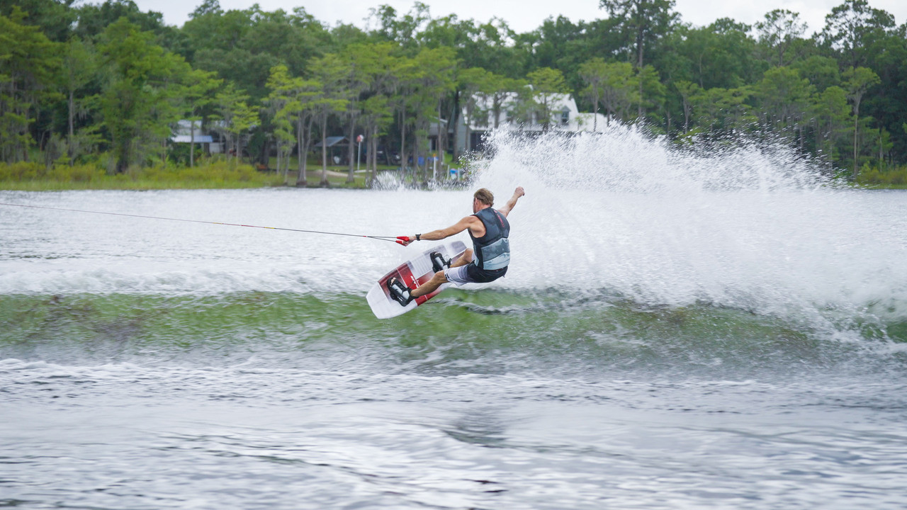 Rider Using Connelly Blaze Wakeboard on the Water Rider Using Connelly Blaze Wakeboard on the Water