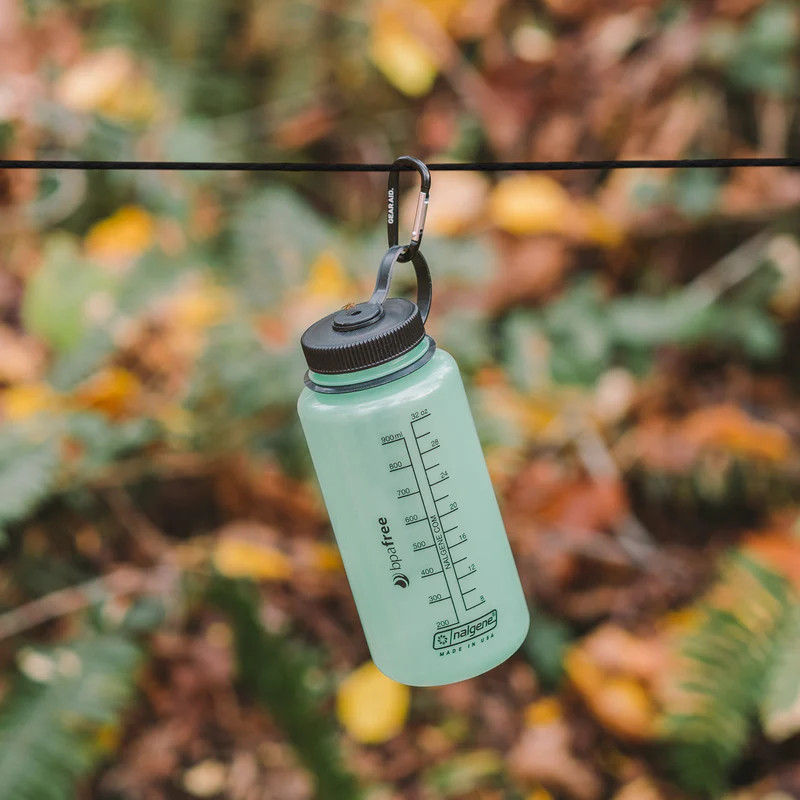 GEAR AID 325 paracord with included carabiner holding water bottle
