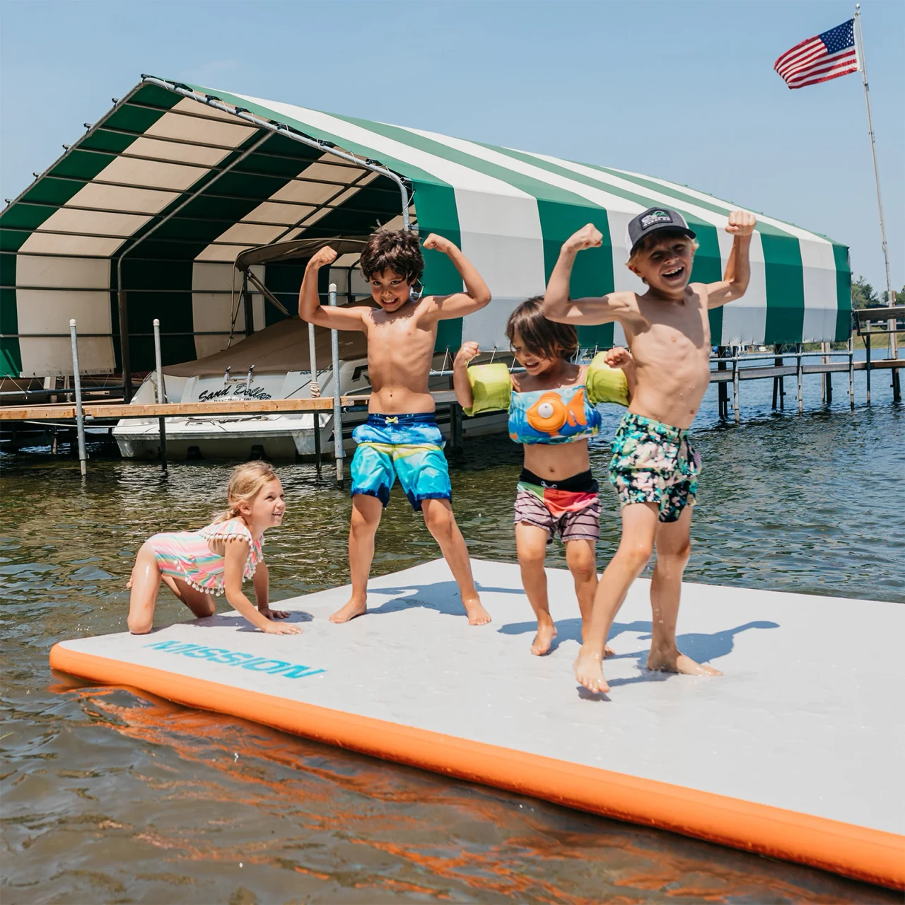 Mission REEFMAT inflatable floating dock platform deployed on calm water