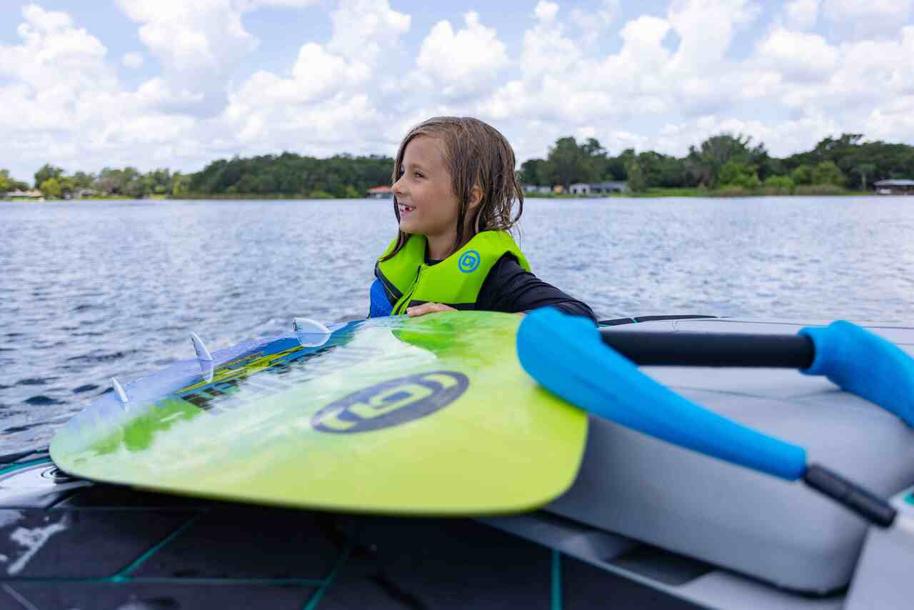 O'Brien Micro Dust wakesurf board for beginner kids behind the boat