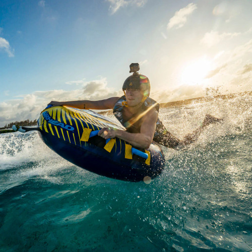 Airhead Strike deck tube in action behind a boat