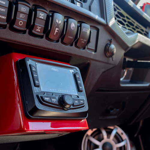 Wet Sounds WS-MC-2 compact marine stereo installed in boat dashboard