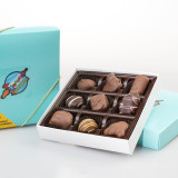 A 9-piece display box of Uranus chocolate, a delicious treat from the famous Uranus Fudge Factory and General Store.