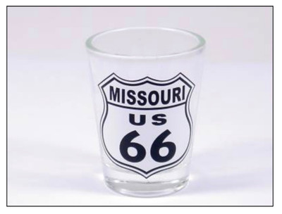 Clear shot glass with Route 66 road sign that says "Missouri US 66" in black on white background. 