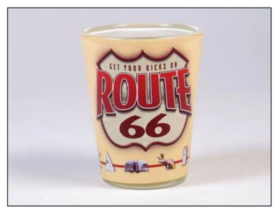 A cream colored souvenir shot glass featuring a red Get Your Kicks on Route 66 shield and retro roadside travel icons