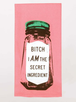 Folded pink dish towel featuring a jar graphic and Bitch I Am The Secret Ingredient text.