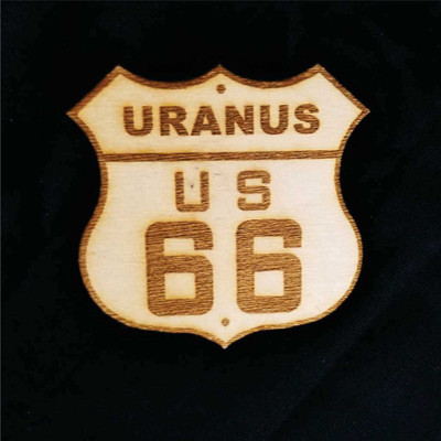 Wooden souvenir shield magnet featuring an engraved Uranus US 66 sign from Uranus Fudge Factory.