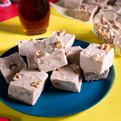 Reduced Sugar Maple Walnut Fudge from Uranus stacked on a plate