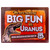 A rectangular metal souvenir sign featuring a Tyrannosaurus Rex with text that reads We are having BIG FUN in URANUS