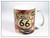 A white ceramic souvenir mug wrapped in a vintage sepia-toned collage design featuring a prominent Route 66 shield