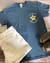 Front blue Uranus Police Dept novelty t-shirt laid flat from Uranus Fudge Factory