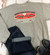 A flat lay of the Uranus Fudge Packers heather gray crewneck sweatshirt