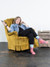 Lifestyle photo of a woman rolling her eyes while wearing I heard you and I don't care socks.
