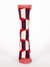 Front view of a red, white, and purple geometric patterned sock.