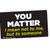 Novelty vinyl sticker featuring a cynical plot twist about worth and importance.