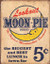 Retro style metal sign for Lookout Moon Pie brand advertisement featuring a crescent moon man and a five cent price.