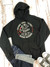 Black Best Fudge novelty hoodie laid flat with jeans and shoes from Uranus Fudge Factory
